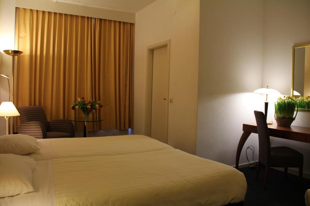 Hotel Alfa Amsterdam Amesterdão Quarto foto